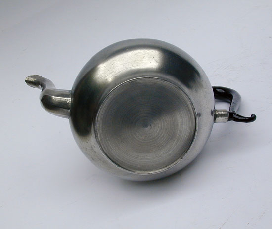 A Unmarked American Pewter Extended Foot Pear Form Teapot