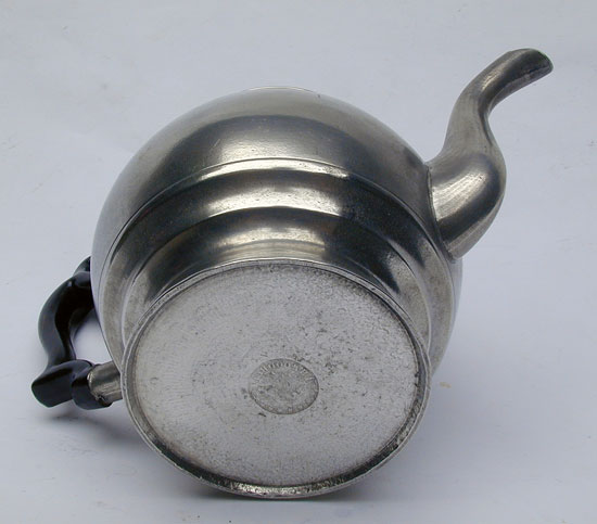 A Pewter Inverted Mold Pewter Teapot by J.B. Woodbury