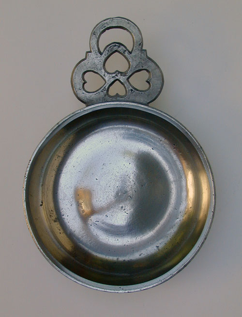 An Unmarked Large Heart Handle Porringer